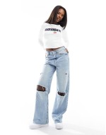 long sve crop top with Sacramento cherry graphic